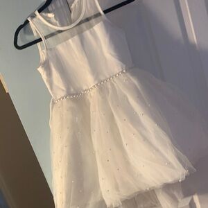 American princess Chic White mesh Detail Dress with pearls. Hi-low hem